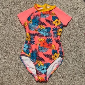 Girls 6-6x one piece. Colorful and in great condition. Barely worn. Zipper works